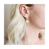 Brass flower hoops from Jules & Clem.