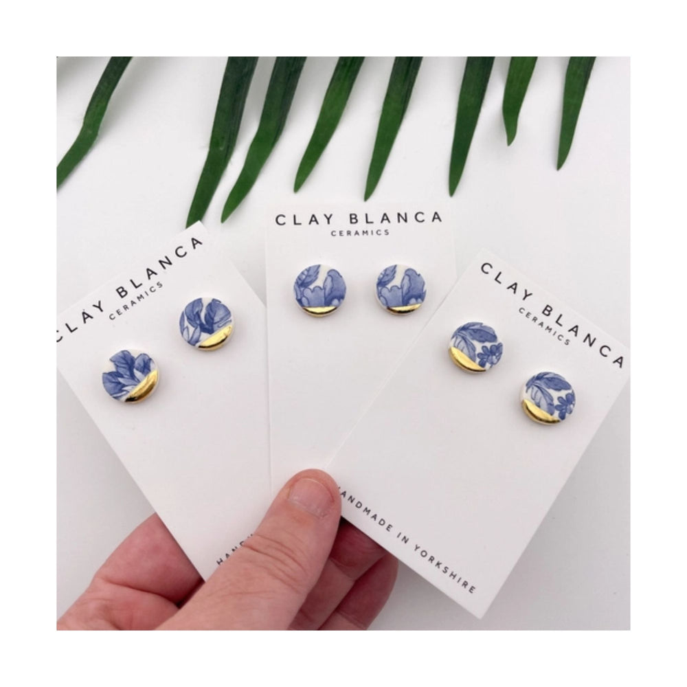 
                  
                    Circle Blue China Studs
                  
                