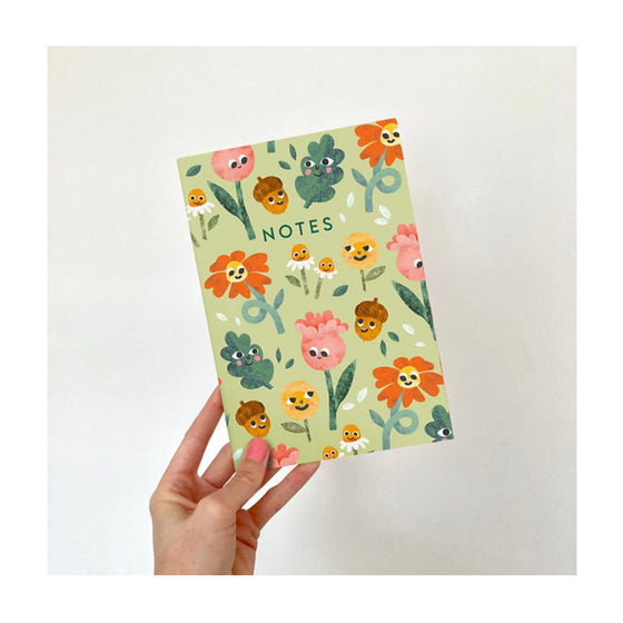 A bright and cheerful A5 notebook with a floral design by Emily Nash. Perfect for all of your doodles, lists and creative ideas, to give as a gift or keep for yourself!