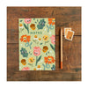 A bright and cheerful A5 notebook with a floral design by Emily Nash. Perfect for all of your doodles, lists and creative ideas, to give as a gift or keep for yourself!