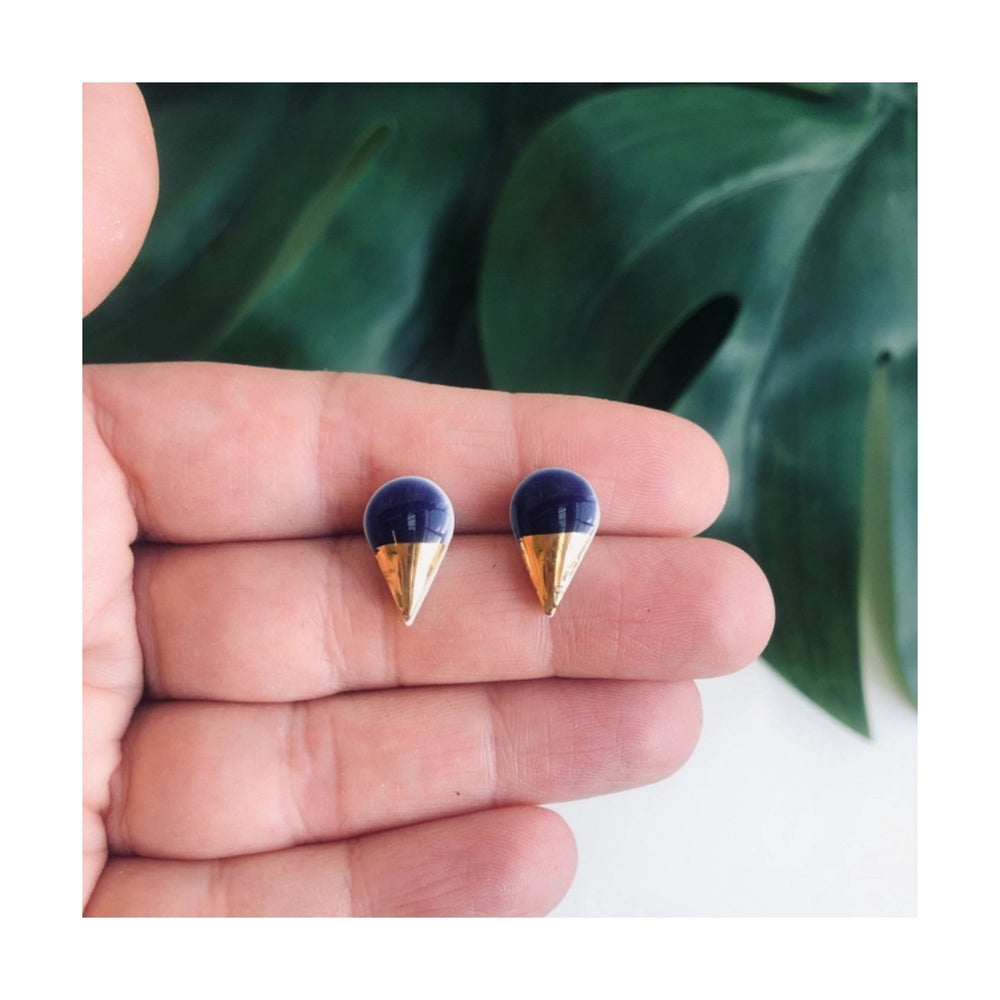 
                  
                    Navy Blue Porcelain Studs
                  
                