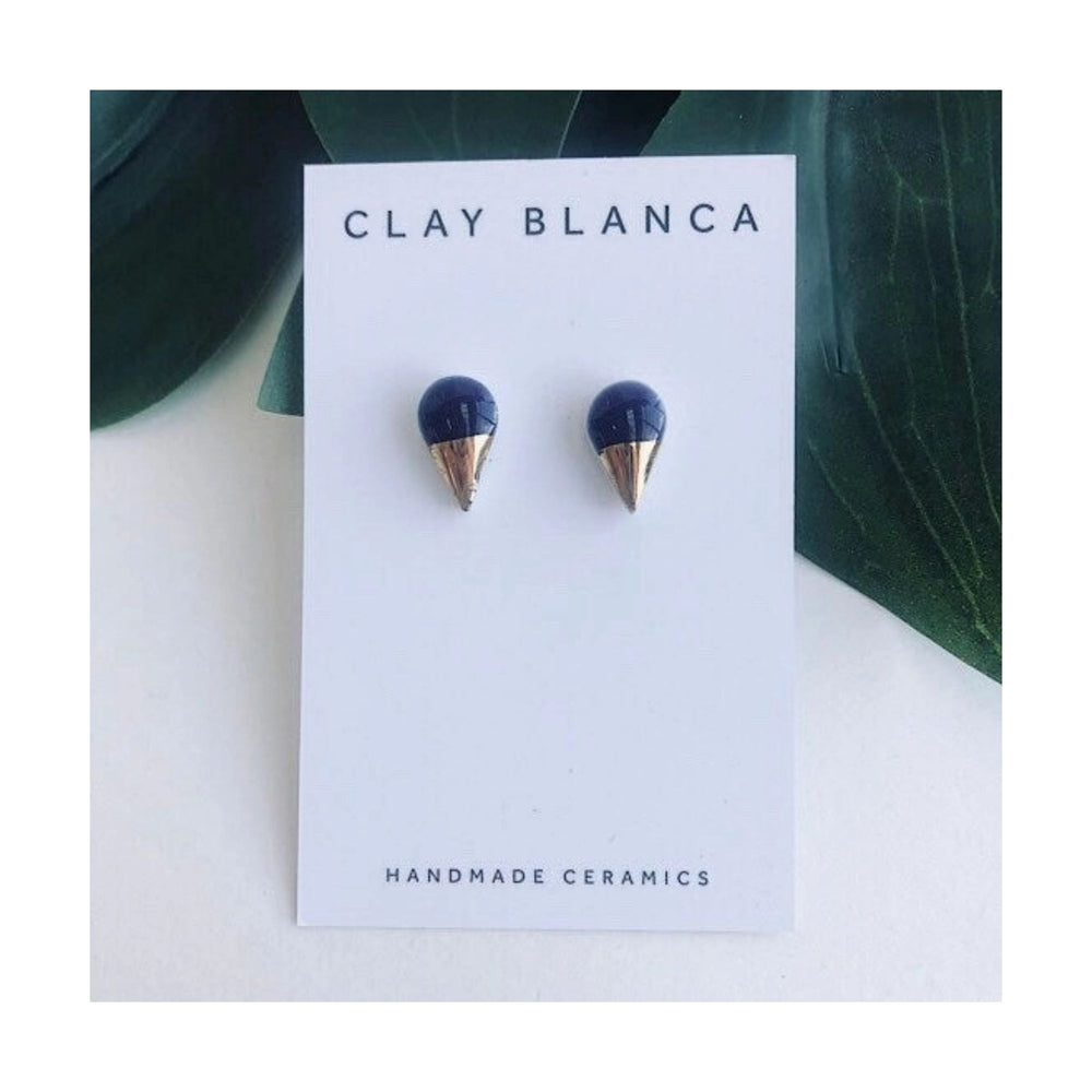 
                  
                    Navy Blue Porcelain Studs
                  
                