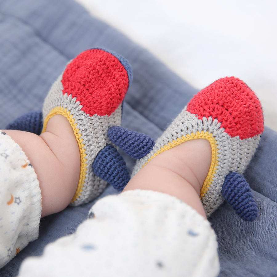 
                  
                    An adorable pair of crochet rocket booties created by Albetta.
                  
                