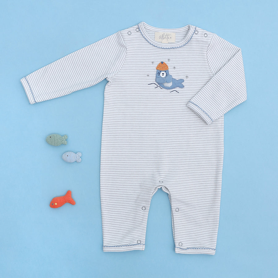 
                  
                    An adorable stripy babygro with Sebby Seal appliqué by Albetta.
                  
                