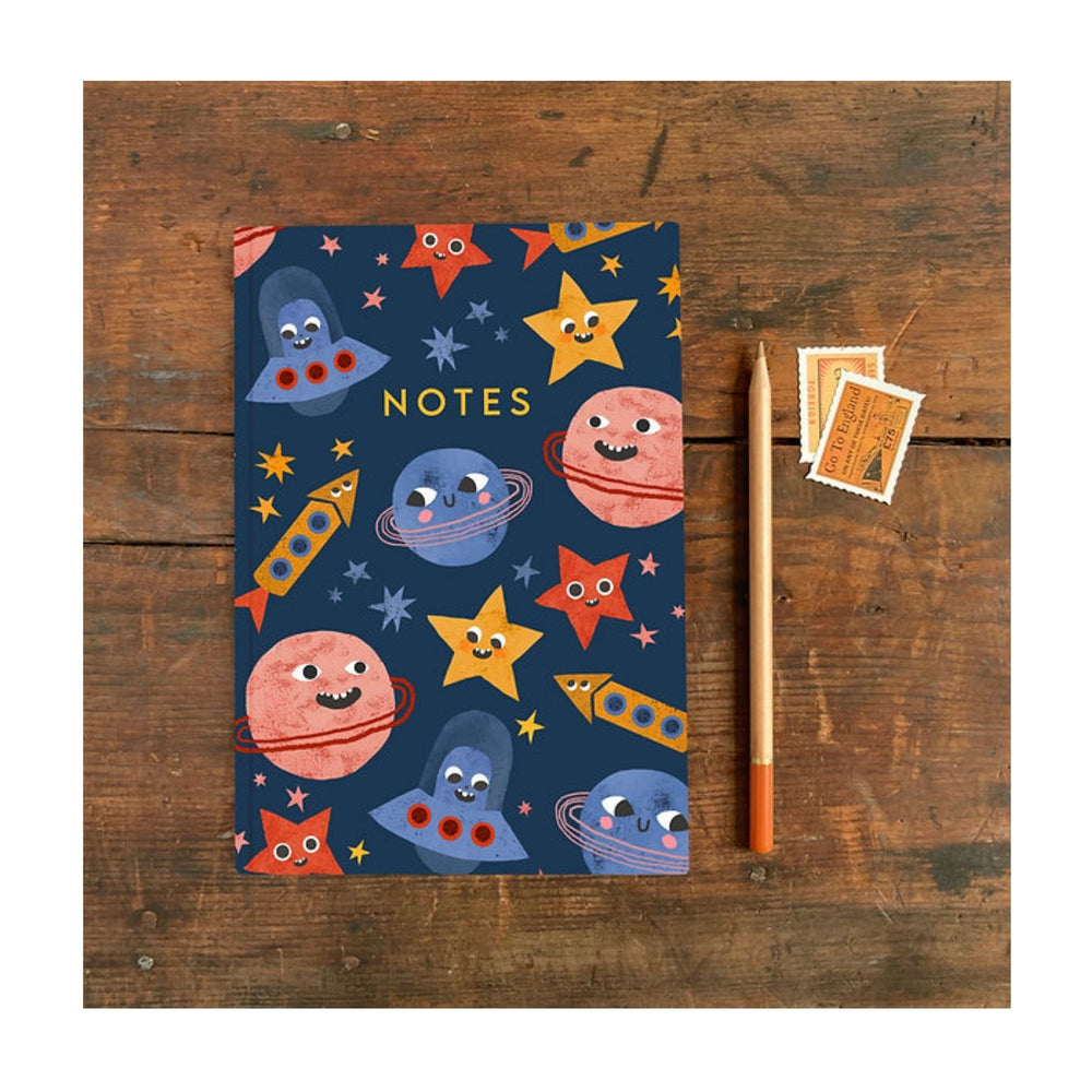 A fun and silly space themed A5 notebook with a stars and planet design, by Emily Nash. Perfect for all of your doodles, lists and creative ideas, to give as a gift or keep for yourself!