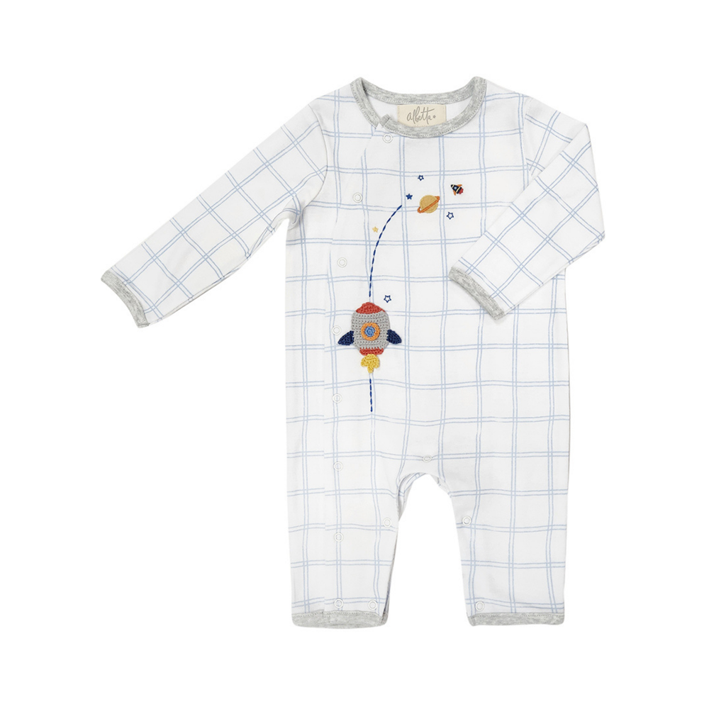 
                  
                    A babygro from Albetta Creations featuring applique crochet Rocket and space icons on a white and blue check background.
                  
                