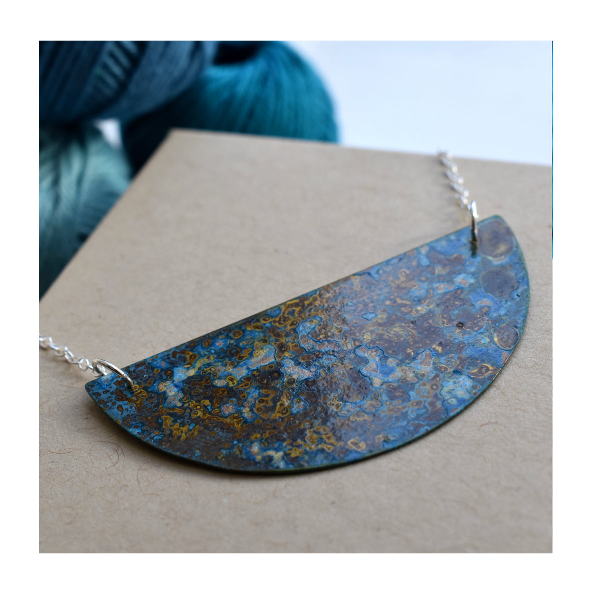 Small Brass Crescent Patinated necklace with sterling silver chain, by Stephanie Hopkins